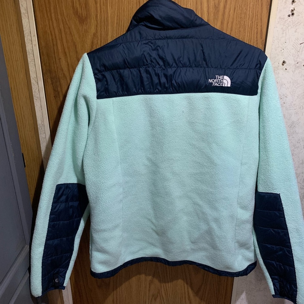 Women’s Large North Face fleece zip up jacket.